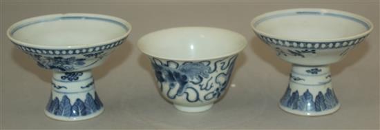 A pair of Chinese blue and white stem bowls, and a further bowl, late 19th / early 20th century, 9.5cm